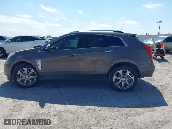 2015 Cadillac SRX Performance Collection with VIN 3GYFNCE31FS598109, listed as a IAAI auction lot 41788267 with 172,488 mi miles and . Bid and sale history available at DreamBid. Image 14.