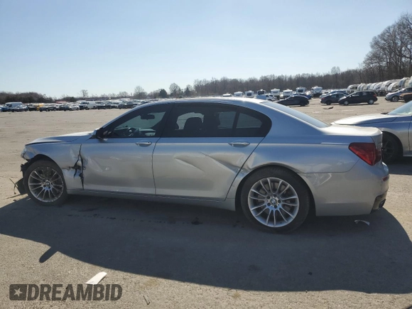 2013 BMW 7 Series 750Li xDrive с VIN WBAYF8C5XDD141001, выставлен на аукционе Copart как лот 48727635 с пробегом 131 462 миль миль и Списание • Salvage title. История ставок и продаж доступна на DreamBid. Изображение 2.
