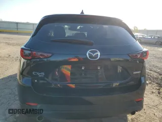 2023 Mazda CX-5 2.5 S Preferred Package with VIN JM3KFBCM8P0227133, listed as a Copart auction lot 77595004 with 25,204 mi miles and Salvage Title. Bid and sale history available at carsss.com. Image 6.