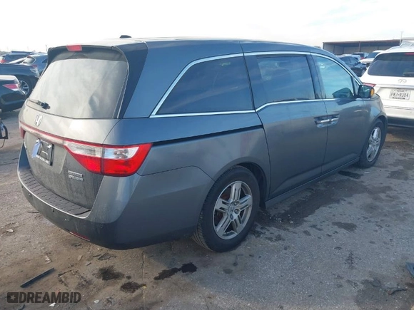 2012 Honda Odyssey Touring with VIN 5FNRL5H99CB033289, listed as a IAAI auction lot 41407301 with NaN miles. Bid and sale history available at carsss.com. Image 4.
