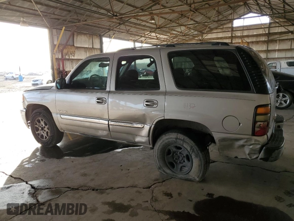2004 GMC Yukon SLE with VIN 1GKEC13V04R253528, listed as a Copart auction lot 82235244 with 245,584 mi miles and Salvage Title. Bid and sale history available at carsss.com. Image 2.