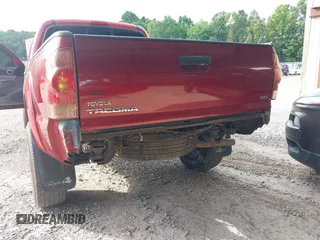 2014 Toyota Tacoma with VIN 3TMMU4FN8EM068048, listed as a IAAI auction lot 42633506 with 126,339 mi miles and . Bid and sale history available at DreamBid. Image 6.