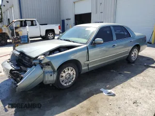 2006 Mercury Grand Marquis GS Convenience z VIN 2MEFM74W16X647926, wystawiony jako Copart lot #48807805 z przebiegiem 151 140 mil mil oraz Szkoda całkowita • Salvage title. Historia ofert i sprzedaży dostępna na DreamBid. Obrazek 1.