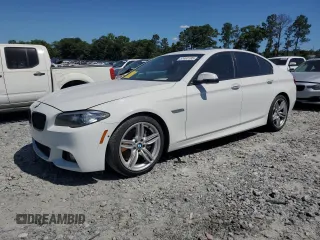 2016 BMW 5 Series 550i with VIN WBAKN9C50GD962076, listed as a Copart auction lot 57461185 with 98,426 mi miles and Salvage title. Bid and sale history available at DreamBid. Image 1.