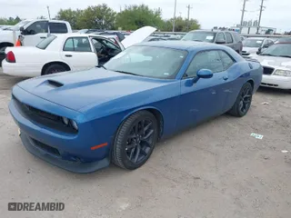 2023 Dodge Challenger GT with VIN 2C3CDZJG8PH582151, listed as a IAAI auction lot 41884343 with 34,259 mi miles. Bid and sale history available at carsss.com. Image 2.