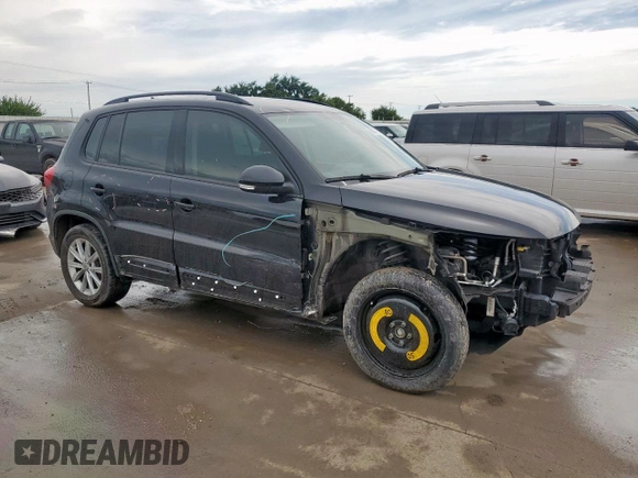 2017 Volkswagen Tiguan S with VIN WVGAV7AX4HK045724, listed as a Copart auction lot 60621715 with 64,004 mi miles and Salvage title. Bid and sale history available at DreamBid. Image 4.