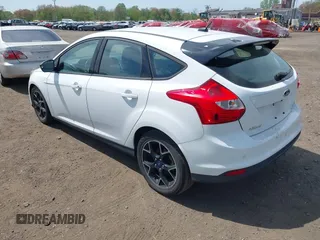 2013 Ford Focus SE with VIN 1FADP3K29DL182434, listed as a IAAI auction lot 42138008 with 103,072 mi miles. Bid and sale history available at carsss.com. Image 3.