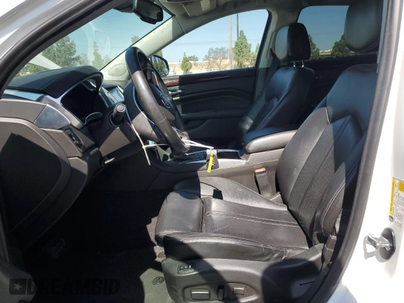 2015 Cadillac SRX Luxury Collection z VIN 3GYFNBE31FS634519, wystawiony jako Copart lot #57292645 z przebiegiem 93 777 mil mil oraz Szkody całkowita. Historia ofert i sprzedaży dostępna na DreamBid. Obrazek 7.