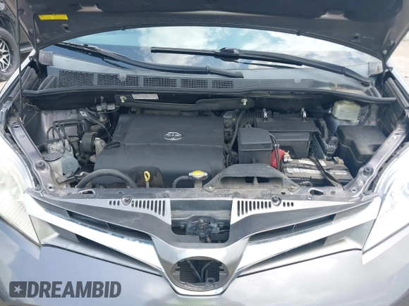 2015 Toyota Sienna XLE with VIN 5TDYK3DCXFS688971, listed as a IAAI auction lot 42127912 with 143,024 mi miles. Bid and sale history available at carsss.com. Image 10.