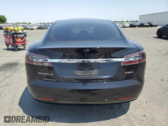 2016 Tesla Model S 90D z VIN 5YJSA1E29GF158774, wystawiony jako Copart lot #60143405 z przebiegiem Nie podano mil oraz Szkoda całkowita • Salvage title. Historia ofert i sprzedaży dostępna na DreamBid. Obrazek 6.