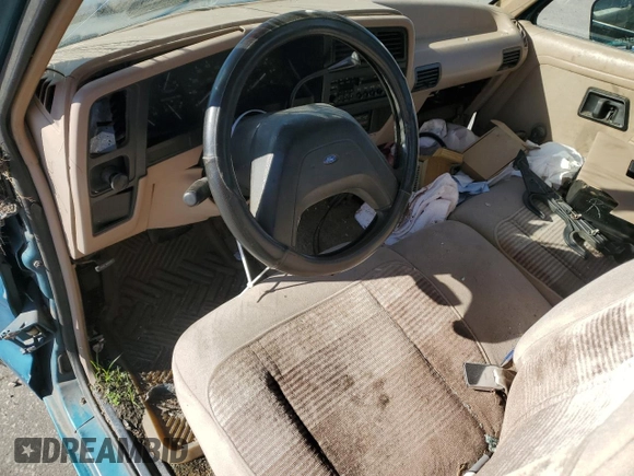 1992 Ford Ranger with VIN 1FTCR10A3NTA81065, listed as a Copart auction lot 74002434 with 9,827 mi miles and Salvage Title. Bid and sale history available at carsss.com. Image 8.