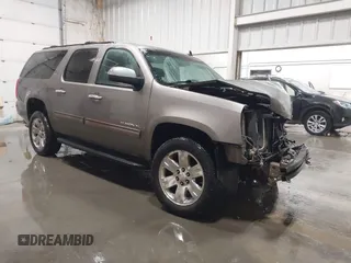 2014 GMC Yukon XL SLT with VIN 1GKS2KE76ER166776, listed as a IAAI auction lot 41056887 with 206,773 mi miles. Bid and sale history available at carsss.com. Image 1.