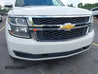 2015 Chevrolet Tahoe Commercial z VIN 1GNLC2EC1FR721538, wystawiony jako IAAI lot #42274601 z przebiegiem 138 991 mil mil oraz . Historia ofert i sprzedaży dostępna na DreamBid. Obrazek 6.