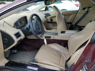 2008 Aston Martin Vantage z VIN SCFBF04B88GD08690, wystawiony jako Copart lot #56514635 z przebiegiem 63 229 mil mil oraz Tytuł czysty. Historia ofert i sprzedaży dostępna na DreamBid. Obrazek 7.