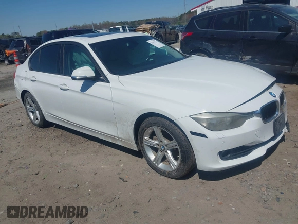 2015 BMW 3 Series 328i xDrive with VIN WBA3B5G59FNS18811, listed as a IAAI auction lot 41867015 with 147,748 mi miles. Bid and sale history available at carsss.com. Image 1.
