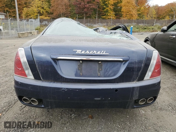 2006 Maserati Quattroporte z VIN ZAMCE39A460025290, wystawiony jako Copart lot #78816054 z przebiegiem Nie podano mil oraz Szkoda całkowita • Salvage title. Historia ofert i sprzedaży dostępna na DreamBid. Obrazek 6.