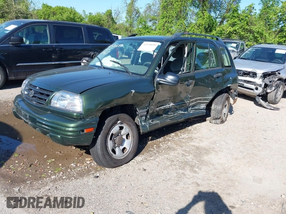 2001 Suzuki Vitara JX z VIN 2S3TD52V416109787, wystawiony jako IAAI lot #42126699 z przebiegiem Nie podano mil oraz . Historia ofert i sprzedaży dostępna na DreamBid. Obrazek 2.