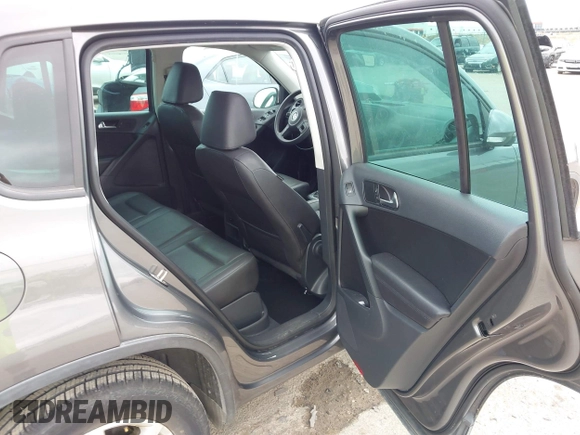 2012 Volkswagen Tiguan SE with VIN WVGAV7AX8CW004451, listed as a IAAI auction lot 42287717 with 110,167 mi miles and . Bid and sale history available at DreamBid. Image 8.