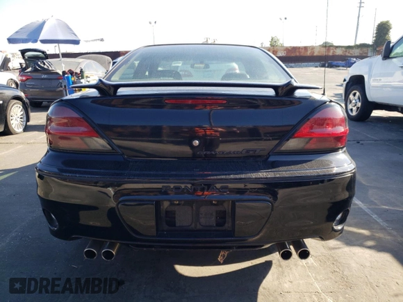 2002 Pontiac Grand Am GT with VIN 1G2NW52E12M704539, listed as a Copart auction lot 73755214 with 100,904 mi miles and Clean Title. Bid and sale history available at carsss.com. Image 6.