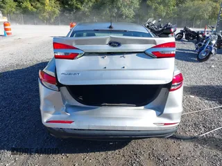 2019 Ford Fusion S with VIN 3FA6P0G70KR209661, listed as a IAAI auction lot 40319091 with 46,466 mi miles and . Bid and sale history available at DreamBid. Image 6.