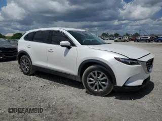 2019 Mazda CX-9 Touring with VIN JM3TCACY7K0327632, listed as a Copart auction lot 60798635 with 63,087 mi miles and Salvage title. Bid and sale history available at DreamBid. Image 4.