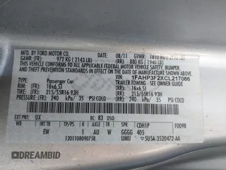 2012 Ford Focus SE with VIN 1FAHP3F2XCL217086, listed as a IAAI auction lot 42072717 with 112,549 mi miles. Bid and sale history available at carsss.com. Image 9.