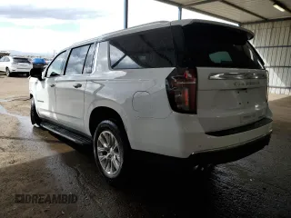 2023 Chevrolet Suburban Premier with VIN 1GNSKFKD8PR543891, listed as a Copart auction lot 53661735 with 34,857 mi miles and Salvage Title. Bid and sale history available at DreamBid. Image 2.