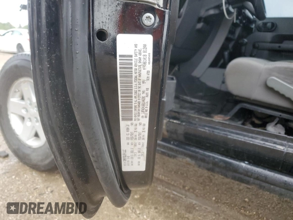 2008 Jeep Wrangler X z VIN 1J8FA24168L646281, wystawiony jako Copart lot #57689895 z przebiegiem 205 348 mil mil oraz Szkoda całkowita • Salvage title. Historia ofert i sprzedaży dostępna na DreamBid. Obrazek 13.
