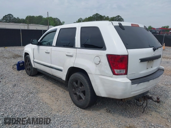 2008 Jeep Grand Cherokee Laredo with VIN 1J8GS48K88C113512, listed as a IAAI auction lot 42093765 with 251,406 mi miles. Bid and sale history available at carsss.com. Image 3.