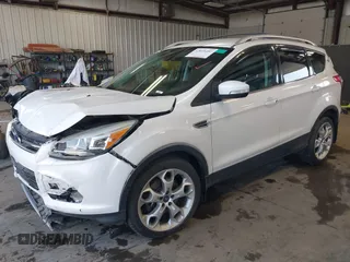 2013 Ford Escape Titanium with VIN 1FMCU9J96DUC60268, listed as a IAAI auction lot 42095407 with 105,307 mi miles and . Bid and sale history available at DreamBid. Image 17.