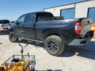 2016 Toyota Tundra 4WD Truck SR with VIN 5TFUM5F12GX065033, listed as a Copart auction lot 70309084 with 144,779 mi miles and Salvage Title. Bid and sale history available at carsss.com. Image 2.