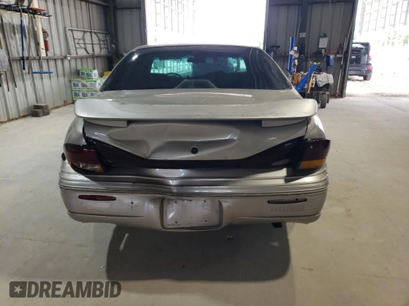 1998 Pontiac Bonneville SE z VIN 1G2HX52K6WH213866, wystawiony jako Copart lot #58358105 z przebiegiem 180 993 mil mil oraz Szkoda całkowita • Salvage title. Historia ofert i sprzedaży dostępna na DreamBid. Obrazek 6.