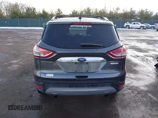 2015 Ford Escape Titanium with VIN 1FMCU0J92FUB74972, listed as a IAAI auction lot 41164519 with 228,785 mi miles and . Bid and sale history available at DreamBid. Image 16.