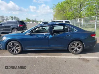 2021 Volkswagen Passat SE with VIN 1VWSA7A36MC010749, listed as a IAAI auction lot 42141065 with 43,571 mi miles and . Bid and sale history available at DreamBid. Image 14.