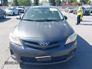 2012 Toyota Corolla L with VIN 2T1BU4EE7CC807246, listed as a IAAI auction lot 42153170 with 366,885 mi miles. Bid and sale history available at carsss.com. Image 12.