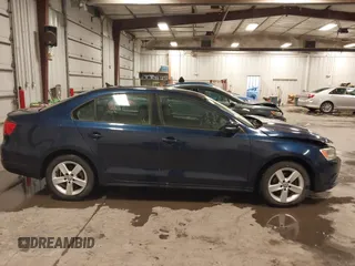 2012 Volkswagen Jetta Sedan TDI with VIN 3VW3L7AJ8CM378733, listed as a IAAI auction lot 41571197 with 151,159 mi miles. Bid and sale history available at carsss.com. Image 13.