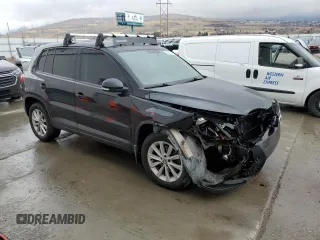 2017 Volkswagen Tiguan S with VIN WVGBV7AX8HK046105, listed as a Copart auction lot 47805145 with 128,900 mi miles and Salvage Title. Bid and sale history available at DreamBid. Image 4.