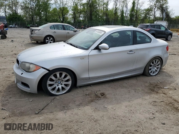 2009 BMW 1 Series 128i with VIN WBAUP73579VK74936, listed as a Copart auction lot 54558905 with 128,563 mi miles and Clean Title. Bid and sale history available at carsss.com. Image 1.