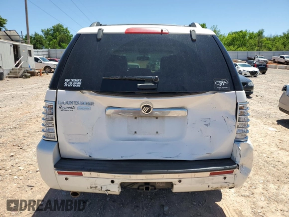 2010 Mercury Mountaineer Premier with VIN 4M2EN3JE7AUJ00474, listed as a Copart auction lot 57774255 with 138,563 mi miles and Salvage title. Bid and sale history available at DreamBid. Image 6.