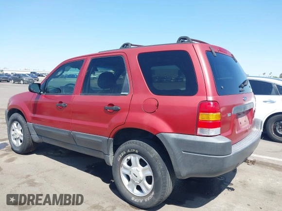 2003 Ford Escape XLT Popular 2 with VIN 1FMYU93123KB02310, listed as a IAAI auction lot 41975073 with 169,864 mi miles. Bid and sale history available at carsss.com. Image 3.