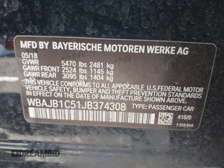 2018 BMW 5 Series 530e xDrive with VIN WBAJB1C51JB374308, listed as a IAAI auction lot 41965038 with 122,791 mi miles and . Bid and sale history available at carsss.com. Image 9.