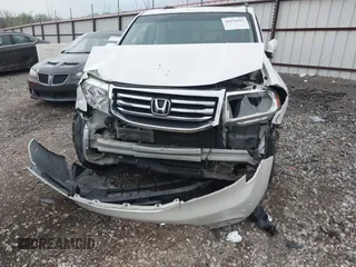 2012 Honda Pilot Touring z VIN 5FNYF4H93CB030515, wystawiony jako IAAI lot #41936563 z przebiegiem Nie podano mil oraz . Historia ofert i sprzedaży dostępna na DreamBid. Obrazek 6.