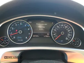 2014 Volkswagen Touareg Lux z VIN WVGEF9BP4ED011436, wystawiony jako Copart lot #74207144 z przebiegiem 207 059 mil mil oraz Szkoda całkowita • Salvage title. Historia ofert i sprzedaży dostępna na DreamBid. Obrazek 9.