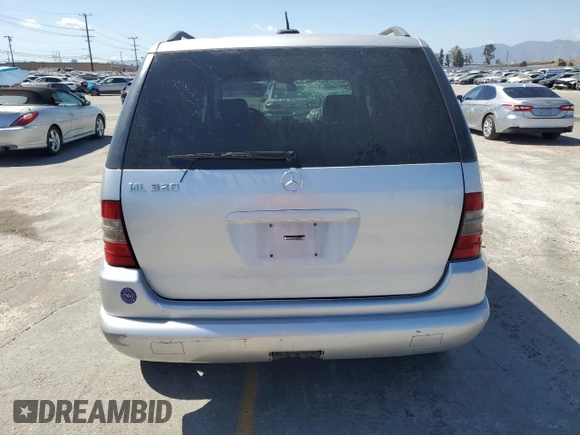 2001 Mercedes-Benz M 320/430/500 z VIN 4JGAB54E71A270139, wystawiony jako Copart lot #57175625 z przebiegiem 154 870 mil mil oraz Szkoda całkowita • Salvage title. Historia ofert i sprzedaży dostępna na DreamBid. Obrazek 6.