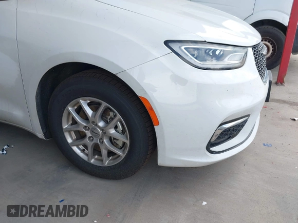 2023 Chrysler Pacifica Touring L with VIN 2C4RC1BG6PR550575, listed as a IAAI auction lot 42576498 with 54,373 mi miles and . Bid and sale history available at DreamBid. Image 17.