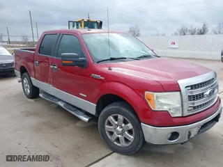 2013 Ford F-150 XL with VIN 1FTFW1CTXDKD88563, listed as a IAAI auction lot 41557298 with 223,301 mi miles. Bid and sale history available at carsss.com. Image 1.