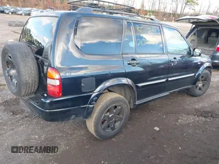 2001 Suzuki XL-7 LX with VIN JS3TY92V114101255, listed as a IAAI auction lot 40995688 with 1 mi miles. Bid and sale history available at carsss.com. Image 4.