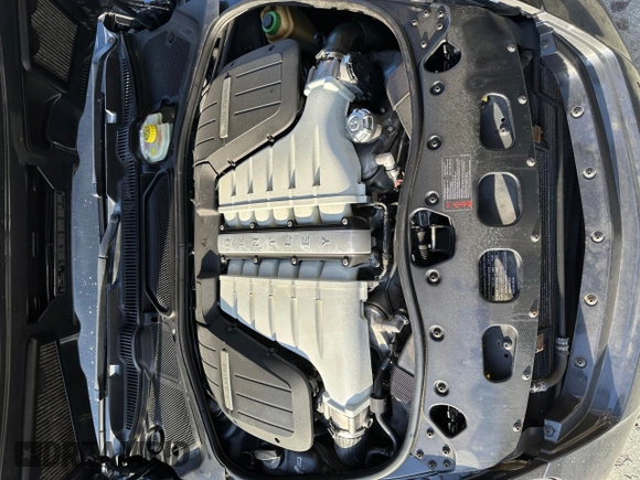 2010 Bentley Continental GT with VIN SCBDR3ZA9AC066604, listed as a Copart auction lot 86160224 with 59,156 mi miles and Salvage Title. Bid and sale history available at DreamBid. Image 7.