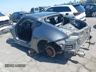 2014 Nissan 370Z Nismo with VIN JN1AZ4EH9EM632501, listed as a IAAI auction lot 39504585 with Not Provided miles and . Bid and sale history available at DreamBid. Image 3.