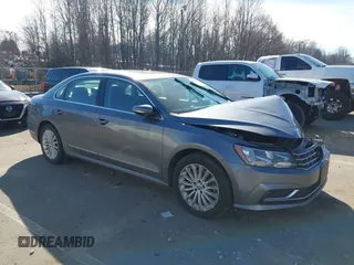 2017 Volkswagen Passat 1.8T SE with VIN 1VWBT7A36HC055030, listed as a IAAI auction lot 41668054 with 156,046 mi miles. Bid and sale history available at carsss.com. Image 1.